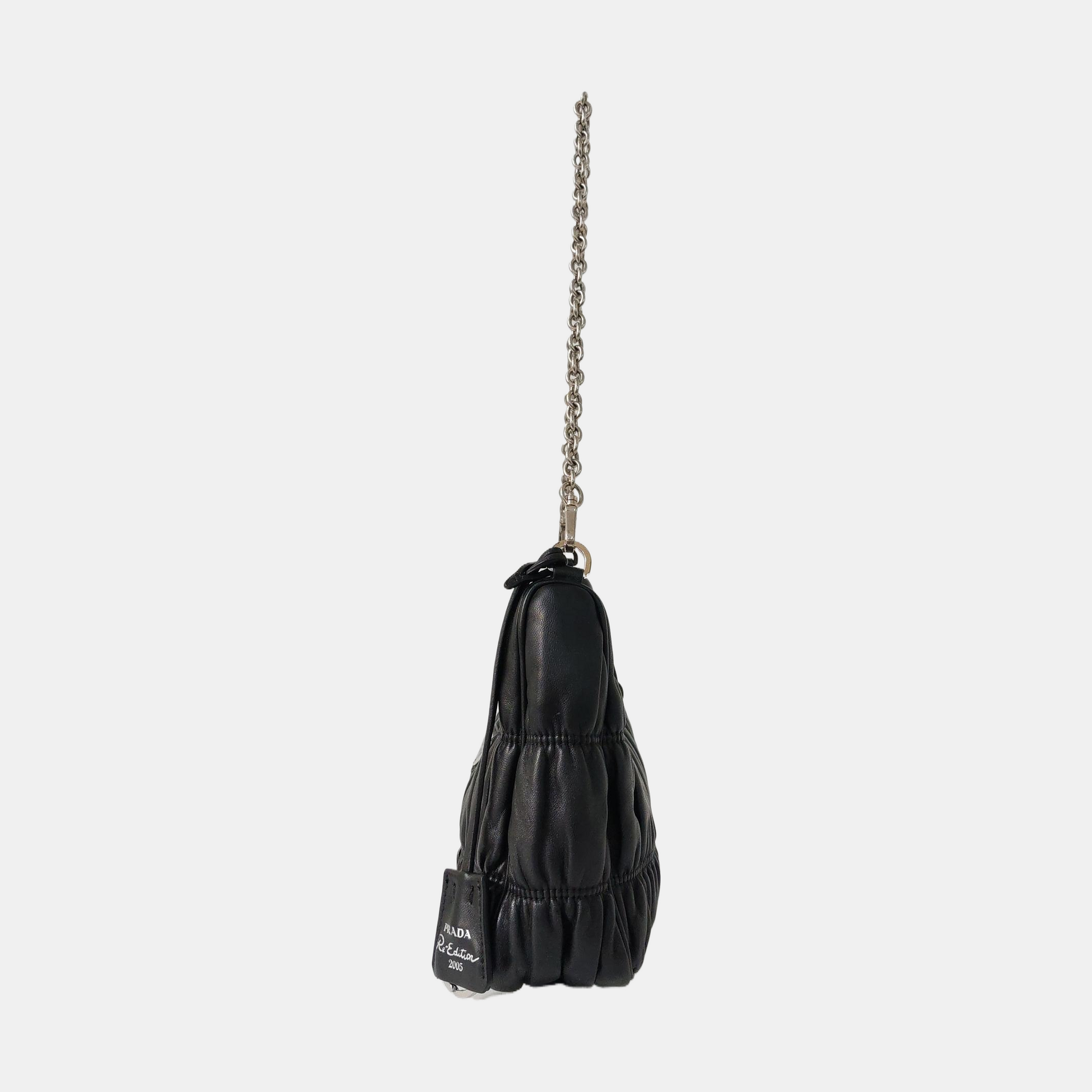 Authenticated pre-owned  Re-Edition2005 Quilted Lambskin Black - Top Handle Bag at Looply