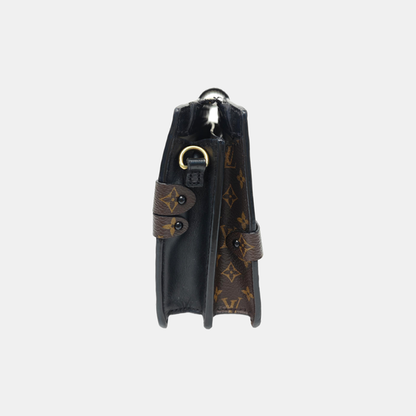 TRUNK Monogram Coated Canvas Brown