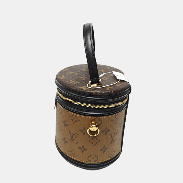 CANNES PM Monogram Coated Canvas Brown