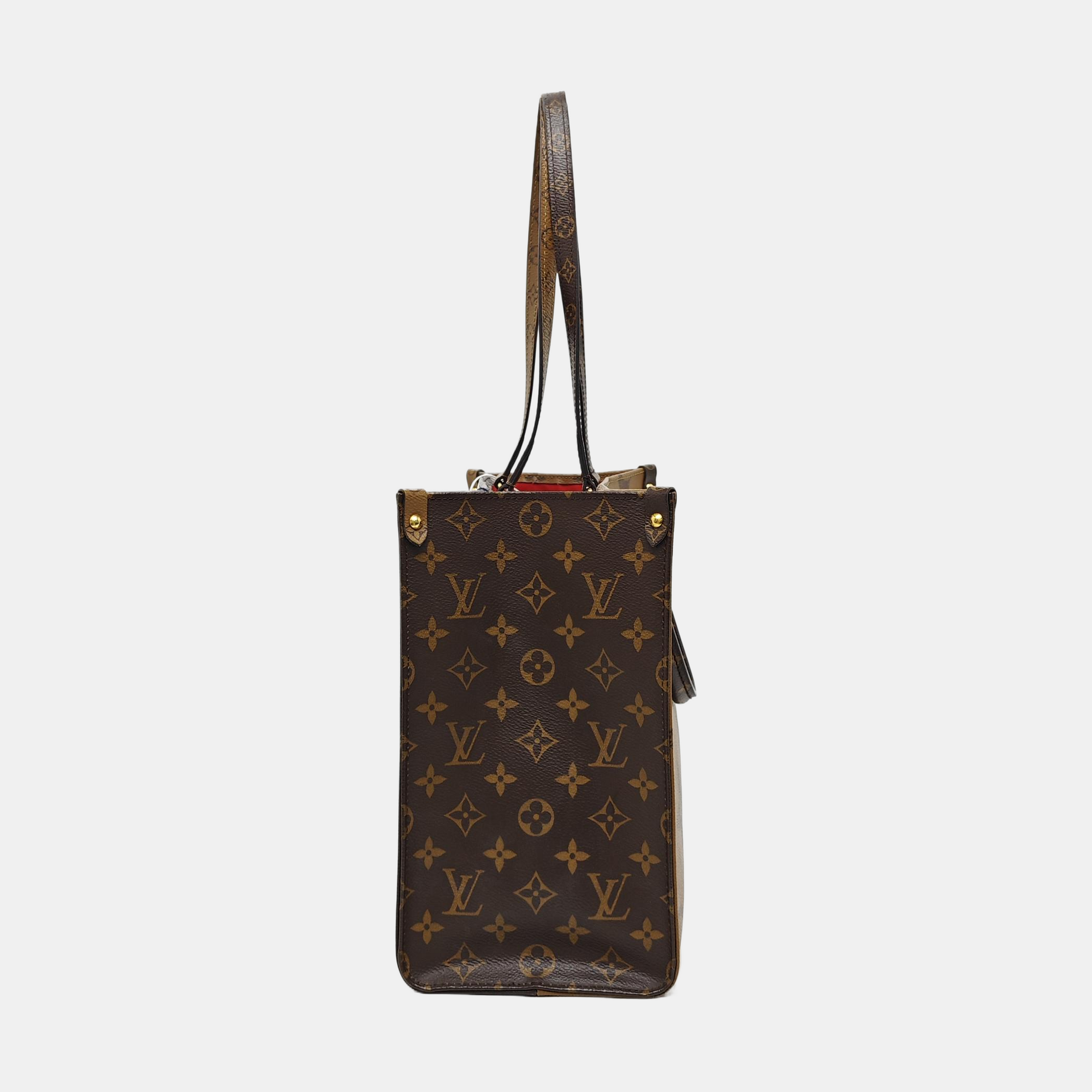 ONTHEGO MM Monogram Coated Canvas Brown