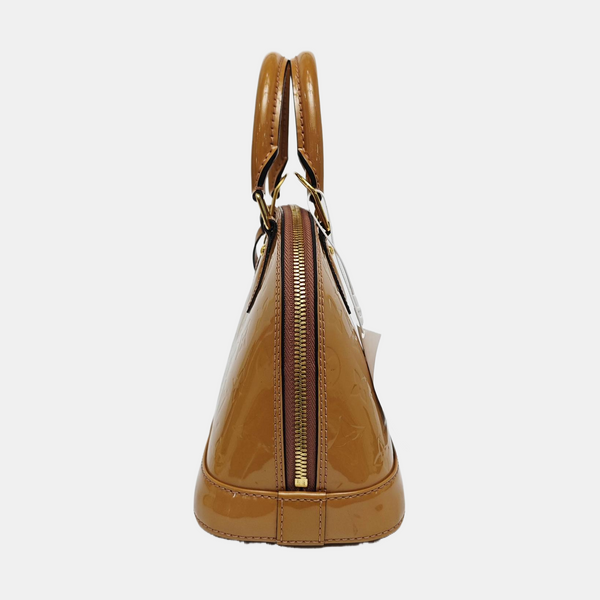 Authenticated pre-owned  ALMA Monogram Patent Leather Yellow - Shoulder Bag at Looply