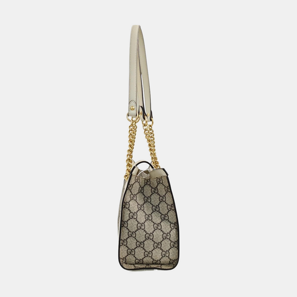 Padlock Small Monogram Coated Canvas Beige