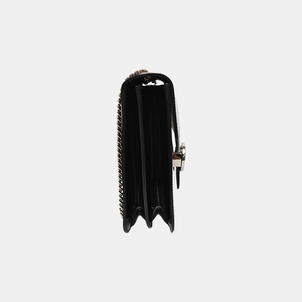 G entrelazada de charol negro grande