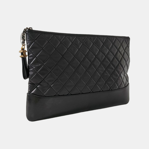 Authenticated pre-owned  GABRIELLE Large Quilted Calfskin Black - Clutch at Looply