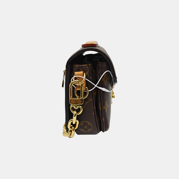 MÉTIS EAST WEST Monogram Coated Canvas Brown