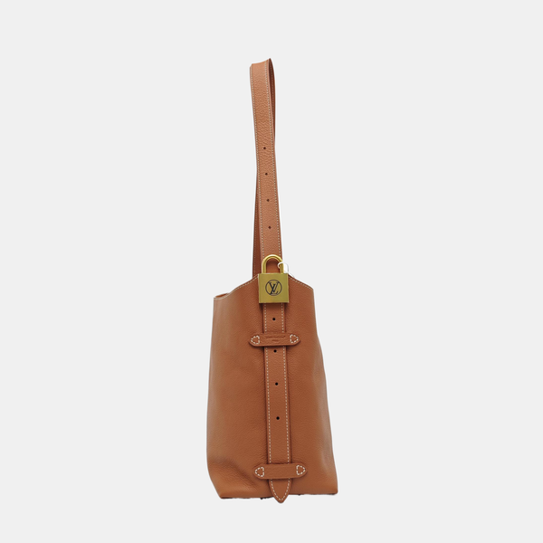LOW KEY HOBO PM Monogram Calfskin Brown