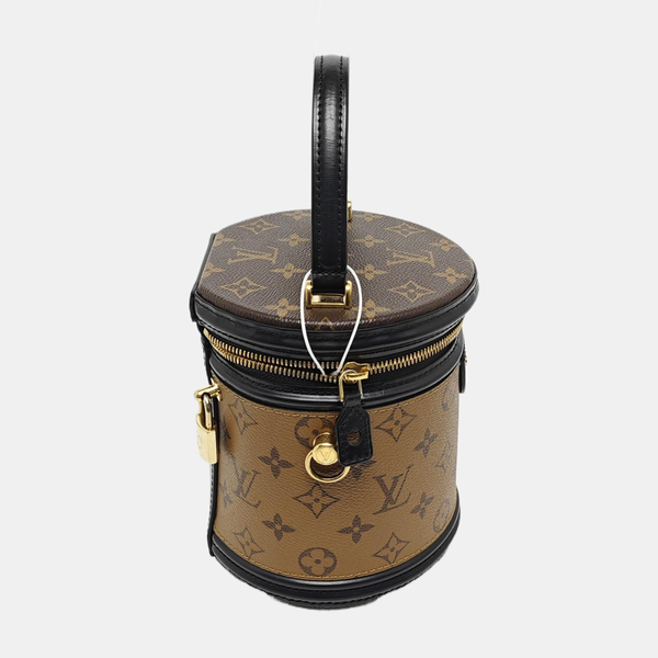 CANNES PM Monogram Coated Canvas Brown