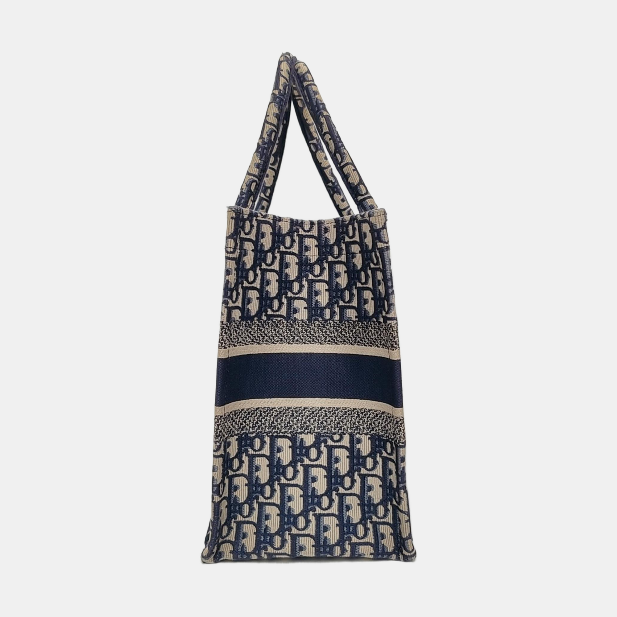 Authenticated pre-owned  Book Tote Medium Monogram Canvas Blue - Tote Bag at Looply