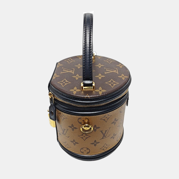 CANNES PM Monogram Coated Canvas Brown