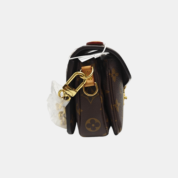 MÉTIS EAST WEST Monogram Coated Canvas Brown