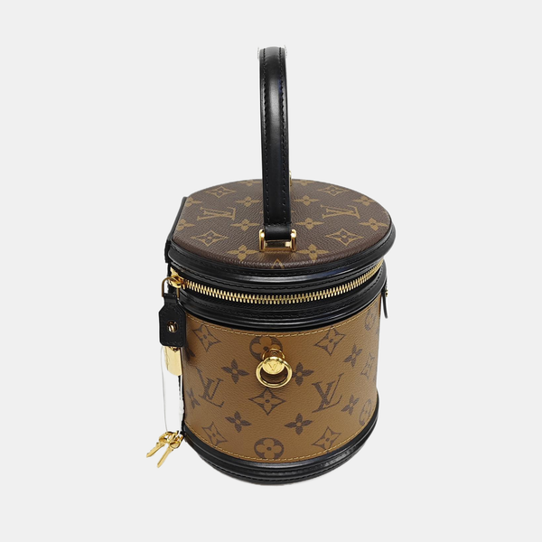 CANNES PM Monogram Coated Canvas Brown