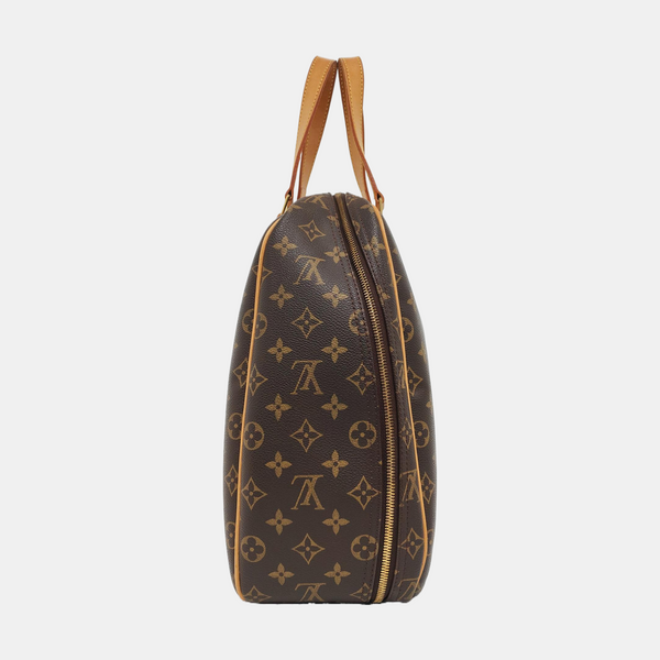 EXCURSION Monogram Coated Canvas Brown