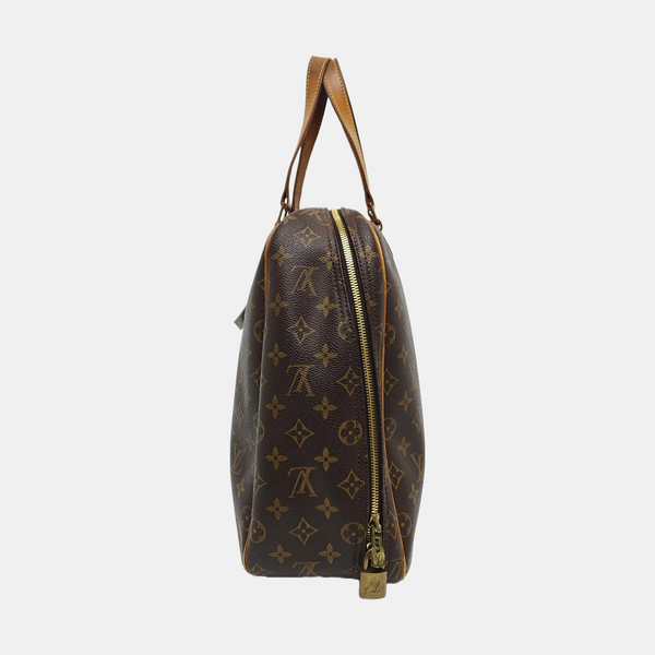 EXCURSION Monogram Coated Canvas Brown