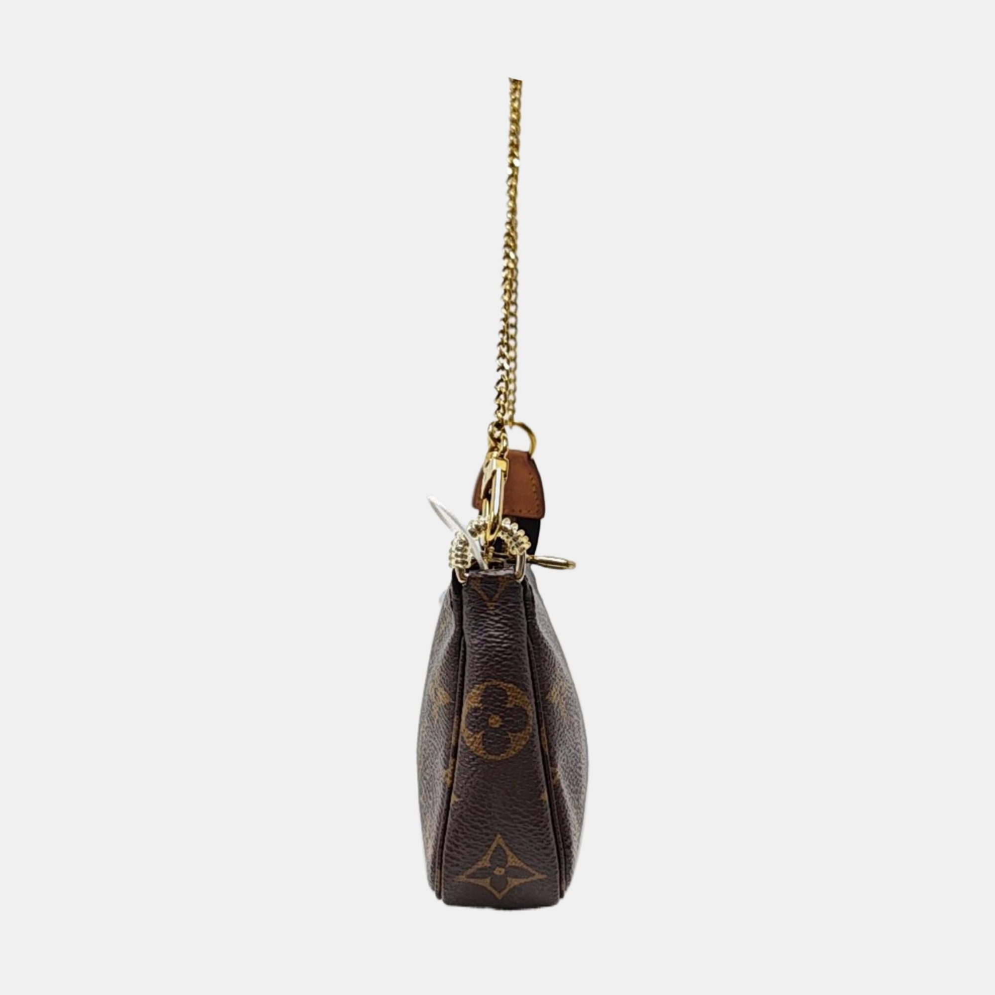 Authenticated pre-owned  ACCESSOIRES Mini Monogram Coated Canvas Brown - Top Handle Bag at Looply