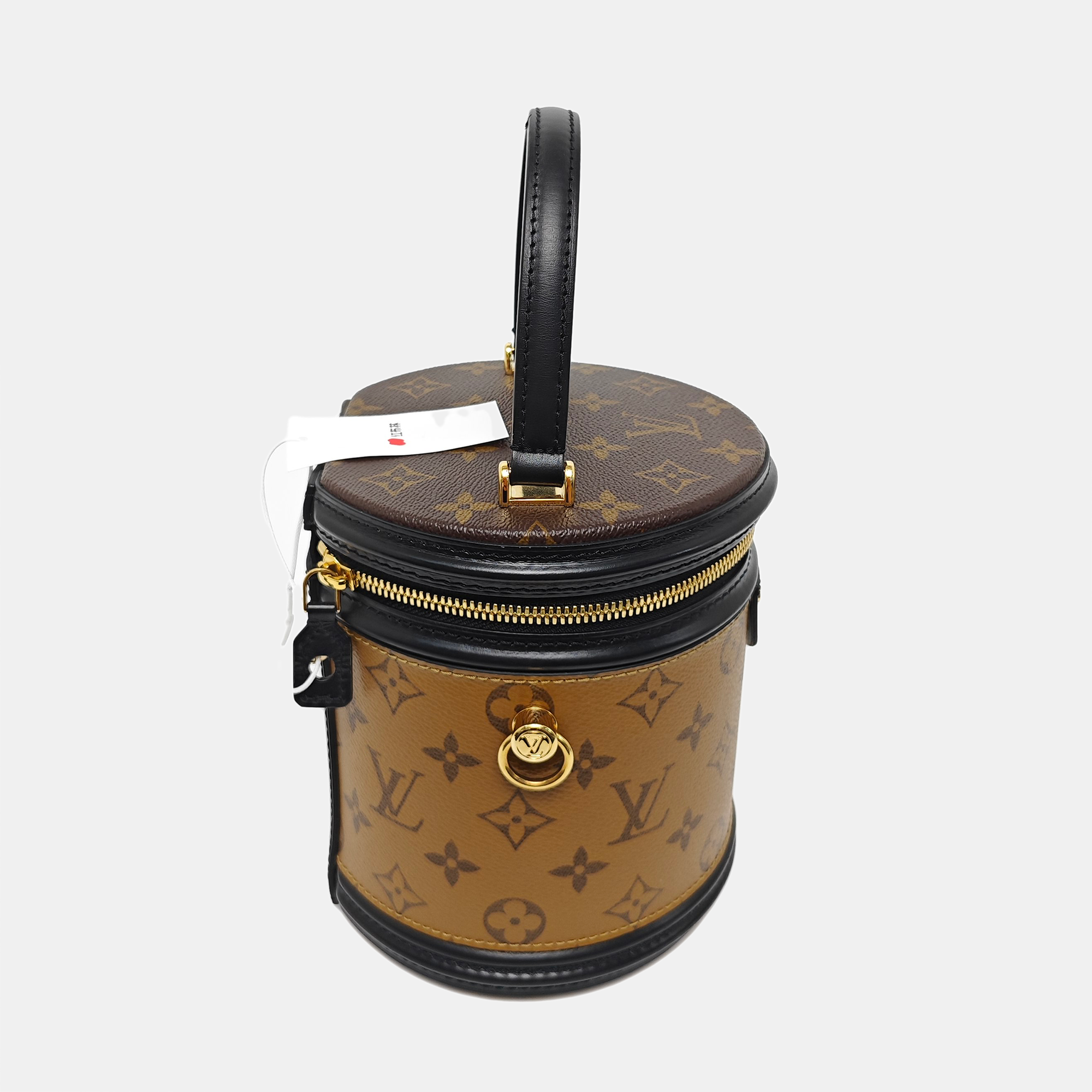CANNES PM Monogram Coated Canvas Brown