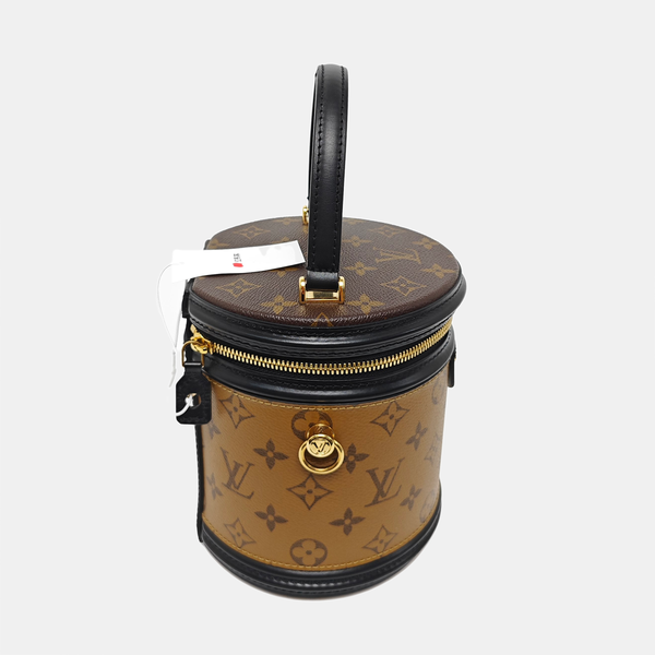 CANNES PM Monogram Coated Canvas Brown
