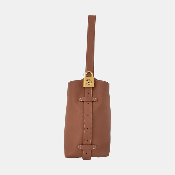 LOW KEY HOBO PM Monogram Calfskin Brown