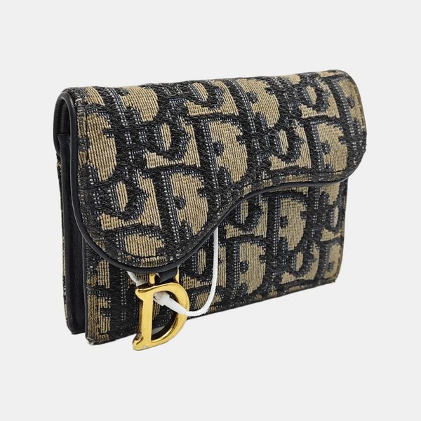 Authenticated pre-owned  Saddle Monogram Canvas Blue Card Holder - Card Holder at Looply