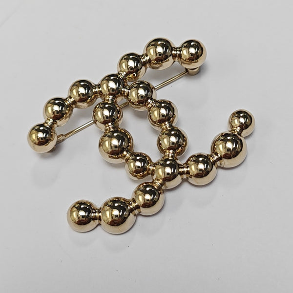 Metal Gold Brooch