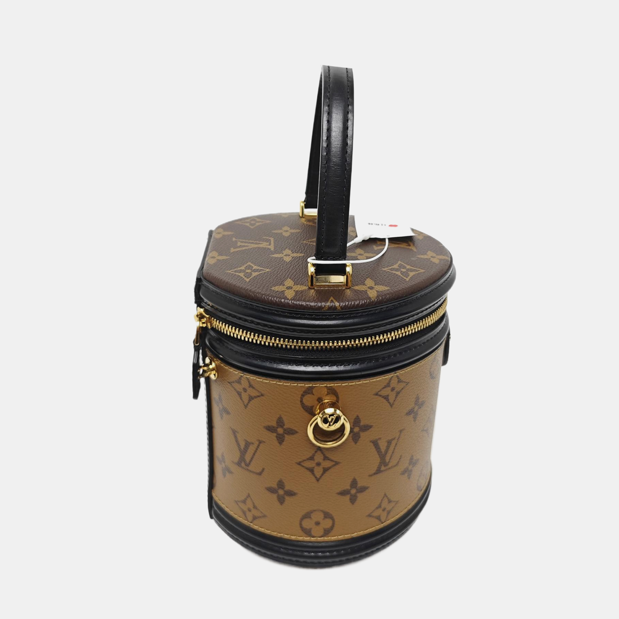 CANNES PM Monogram Coated Canvas Brown