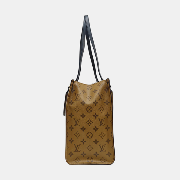 ONTHEGO MM Monogram Coated Canvas Brown