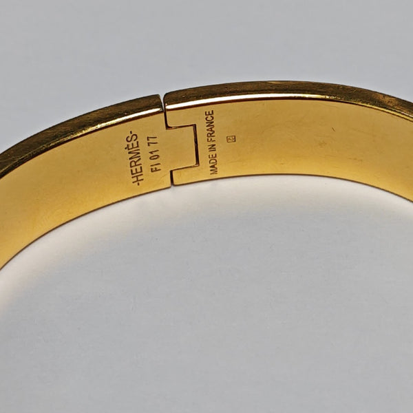Pulsera Clic H Metal Oro