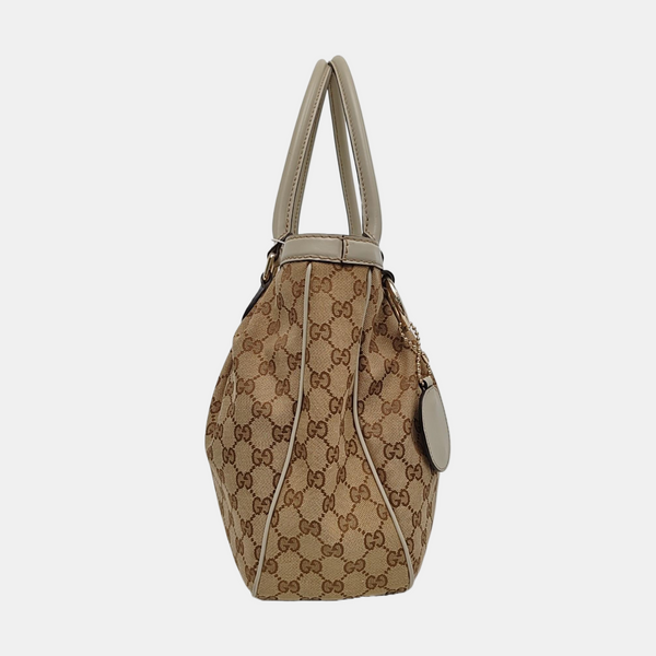 Sukey Monogram Canvas Brown