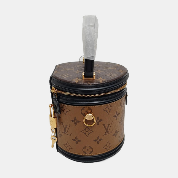CANNES PM Monogram Coated Canvas Brown