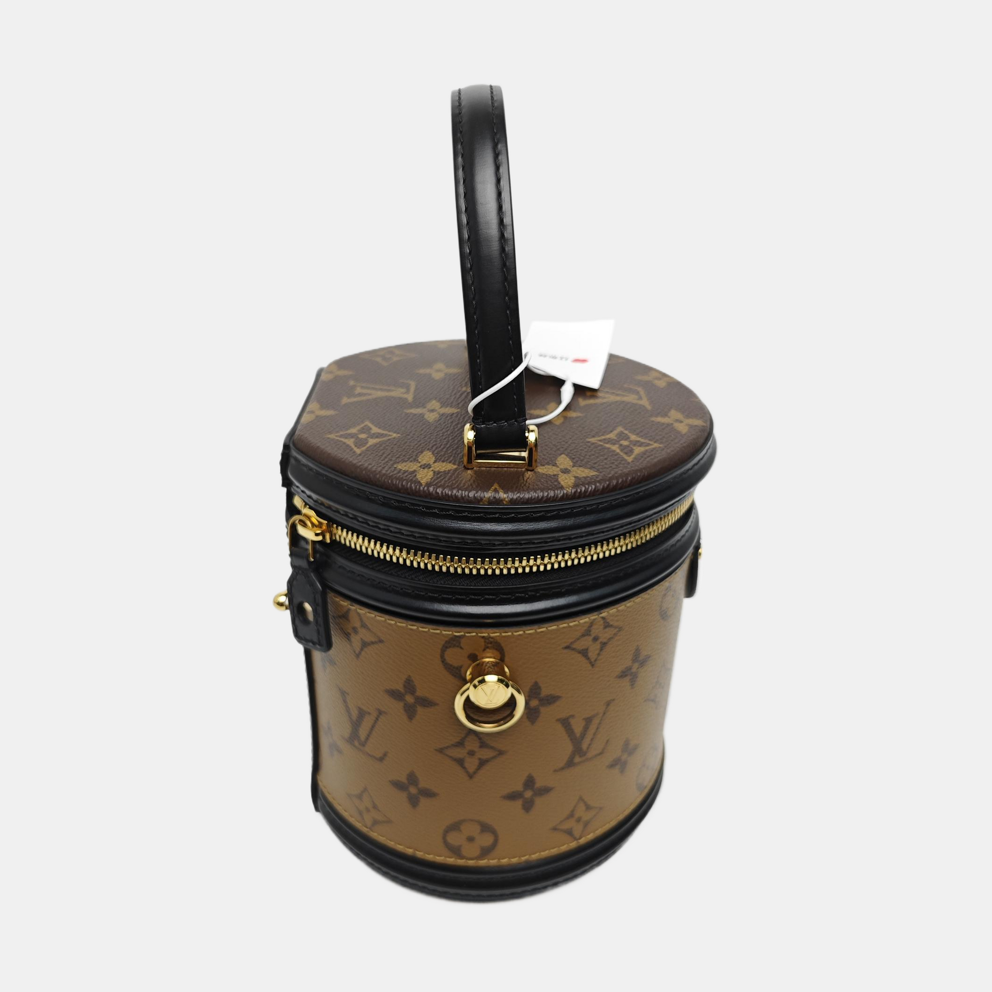 CANNES PM Monogram Coated Canvas Brown