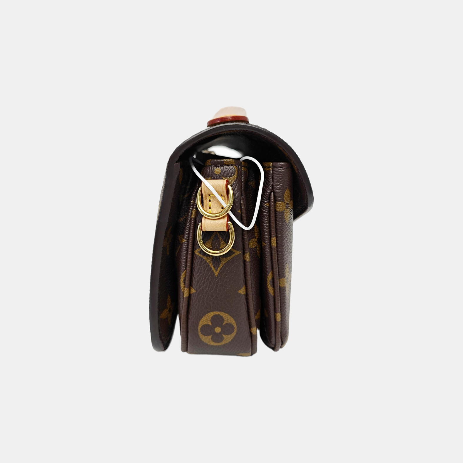 MÉTIS EAST WEST Monogram Coated Canvas Brown