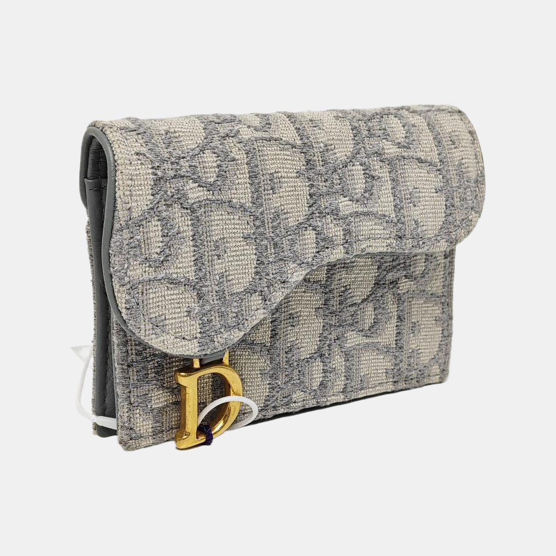 Authenticated pre-owned  Saddle Oblique Fabric Gray Card Holder - Card Holder at Looply