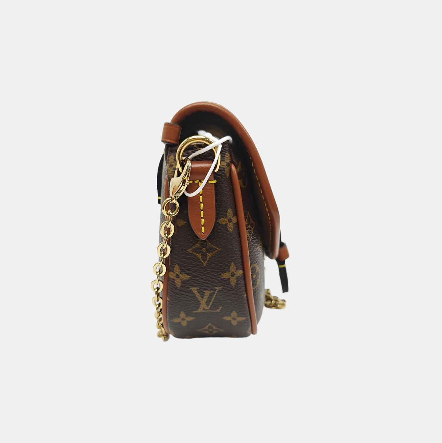 SAUMUR Monogram Coated Canvas Brown