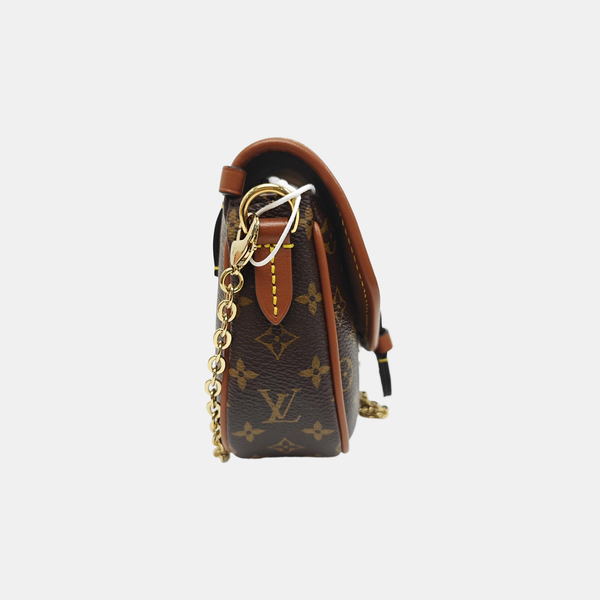 SAUMUR Monogram Coated Canvas Brown