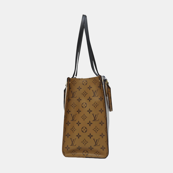 ONTHEGO MM Monogram Coated Canvas Brown