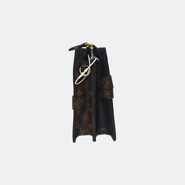 TRUNK Monogram Coated Canvas Brown