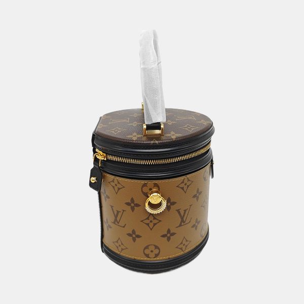 CANNES PM Monogram Coated Canvas Brown