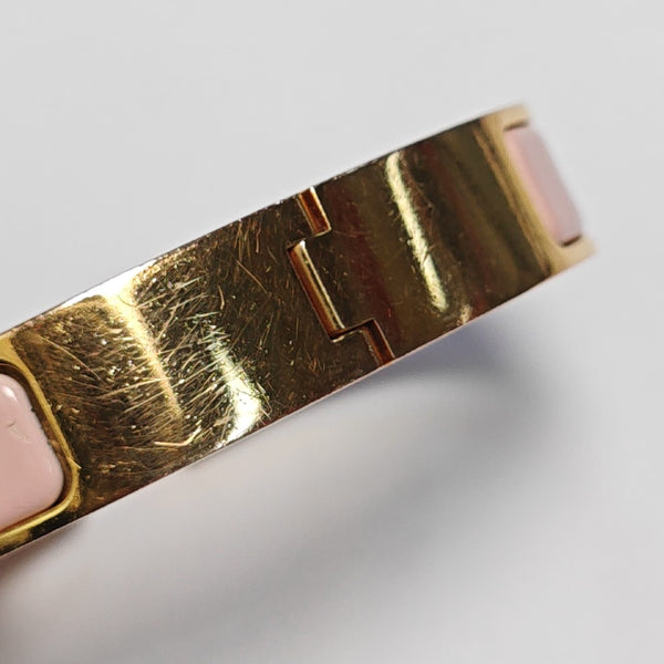 Brazalete Clic H de metal dorado