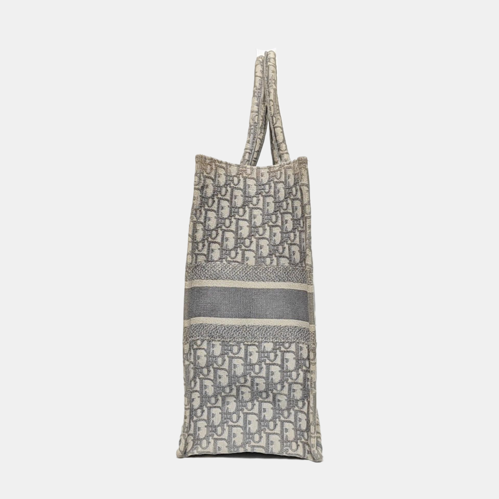 Authenticated pre-owned  Book Tote Large Monogram Canvas Grey - Tote Bag at Looply
