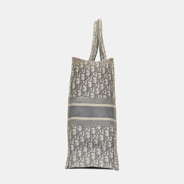 Authenticated pre-owned  Book Tote Large Monogram Canvas Grey - Tote Bag at Looply