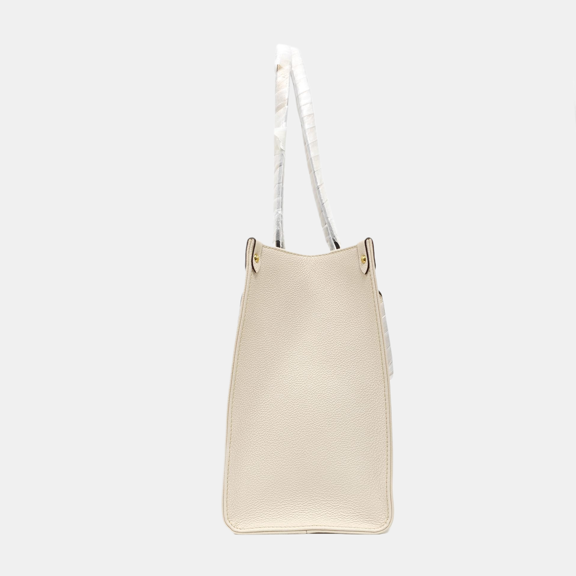 ONTHEGO MM Monogram Calfskin Beige