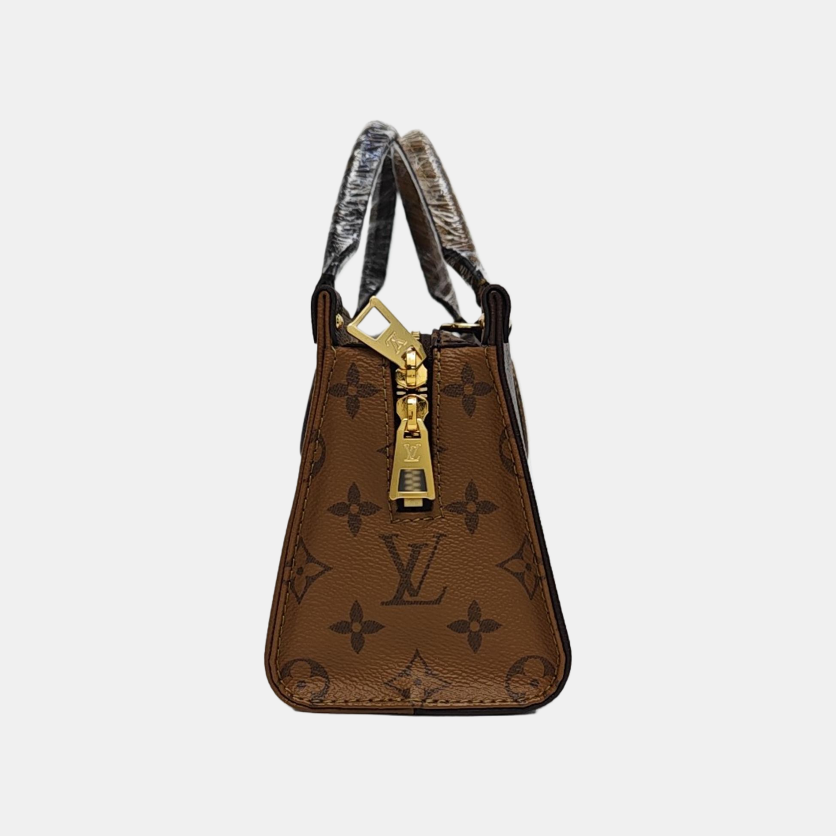 ONTHEGO EAST WEST PM Monogram Coated Canvas Brown