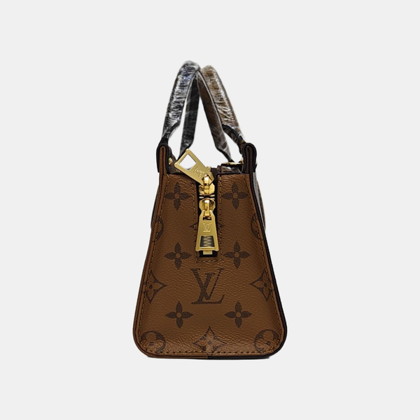 ONTHEGO EAST WEST PM Monogram Coated Canvas Brown