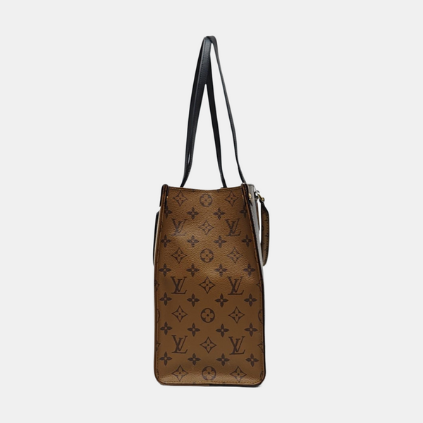 ONTHEGO MM Monogram Coated Canvas Brown