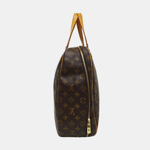 EXCURSION Monogram Coated Canvas Brown