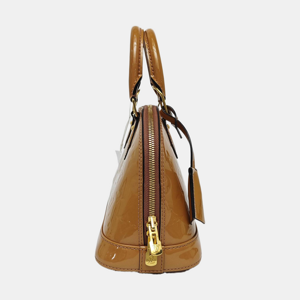 Authenticated pre-owned  ALMA Monogram Patent Leather Yellow - Shoulder Bag at Looply