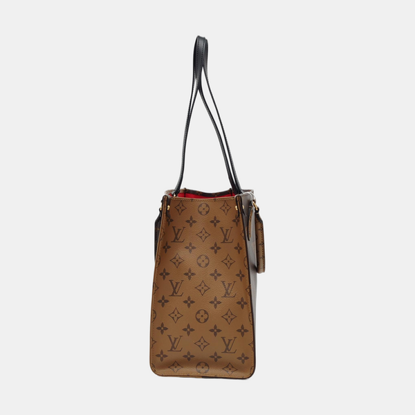 ONTHEGO MM Monogram Coated Canvas Brown
