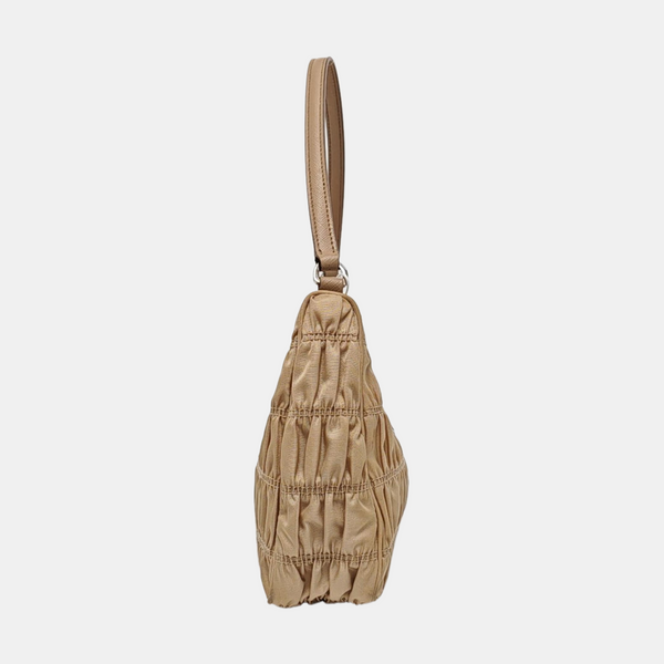 Authenticated pre-owned  Re-Edition2005 Mini Quilted Nylon Beige - Top Handle Bag at Looply