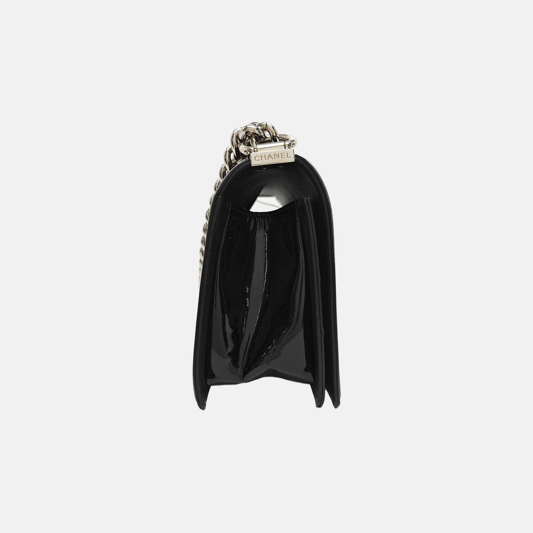 Authenticated pre-owned  BOY CHANEL Medium Quilted Patent Leather Black - Shoulder Bag at Looply