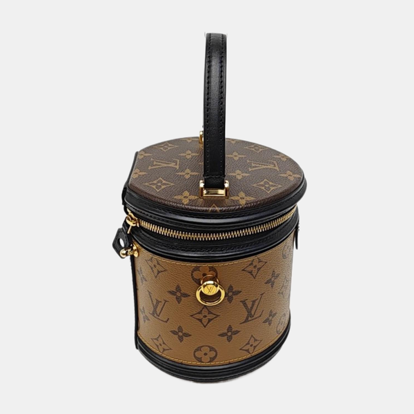 CANNES PM Monogram Coated Canvas Brown