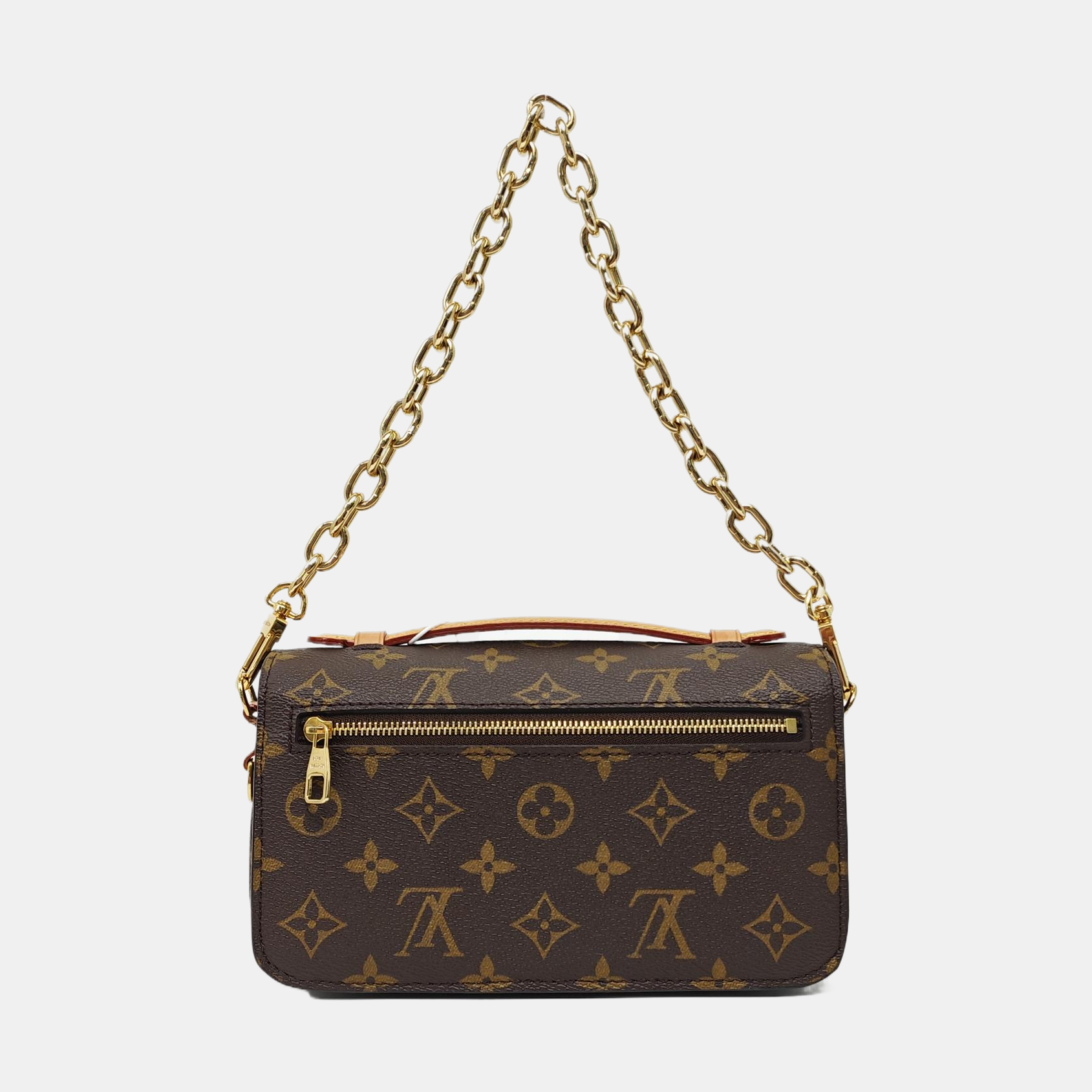 MÉTIS EAST WEST Monogram Coated Canvas Brown